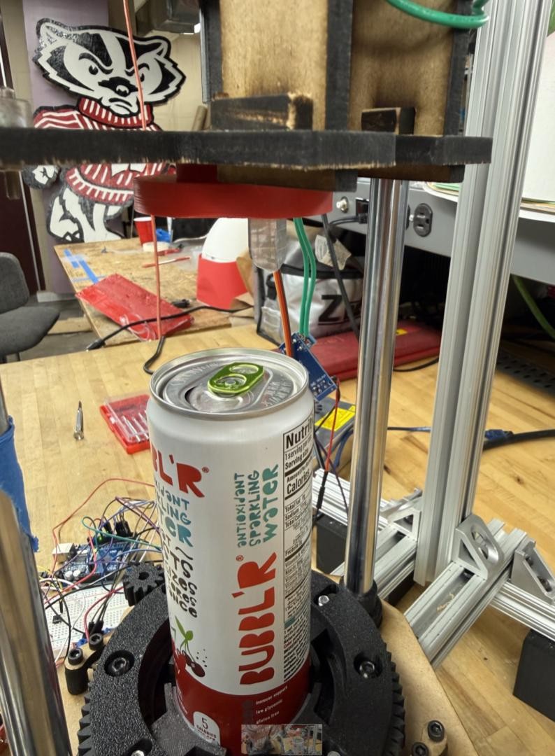 Beverage in lower clamp, post puncture from late prototype.