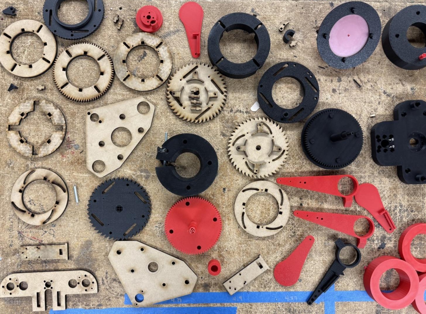 Various test prototypes made from 3D printing and laser cutting for the whole machine.